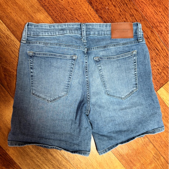 Lucky Brand The Rollup with Exposed Buttons Light Blue Distressed Jean Shorts - Picture 2 of 5